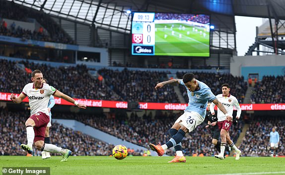 MANCHESTER, ENGLAND - JANUARY 04: Savinho of Manchester City scores his team's first goal during the Premier League match between Manchester City FC and West Ham United FC at Etihad Stadium on January 04, 2025 in Manchester, England. (Photo by Carl Recine/Getty Images)