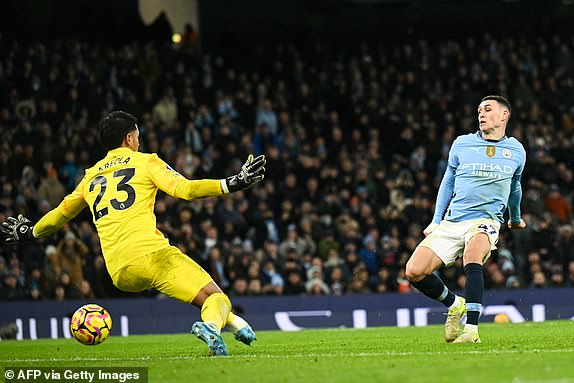 Manchester City's English midfielder #47 Phil Foden (R) shoots and scores his team third goal during the English Premier League football match between Manchester City and West Ham United at the Etihad Stadium in Manchester, north west England, on January 4, 2025. (Photo by Oli SCARFF / AFP) / RESTRICTED TO EDITORIAL USE. No use with unauthorized audio, video, data, fixture lists, club/league logos or 'live' services. Online in-match use limited to 120 images. An additional 40 images may be used in extra time. No video emulation. Social media in-match use limited to 120 images. An additional 40 images may be used in extra time. No use in betting publications, games or single club/league/player publications. /  (Photo by OLI SCARFF/AFP via Getty Images)