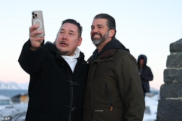 Donald Trump Jr, right, poses for a photo as he arrives in Nuuk, Greenland, this week.