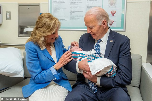 First lady Jill Biden (left) and President Joe Biden (right) welcomed their first great-grandchild Wednesday: William Brannon Neal, IV (center) - the son of Naomi Biden and her husband Peter Neal