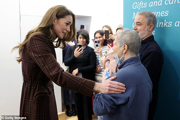 The Princess of Wales hugs patient Rebecca Mendelhson at the Royal Marsden Hospital today