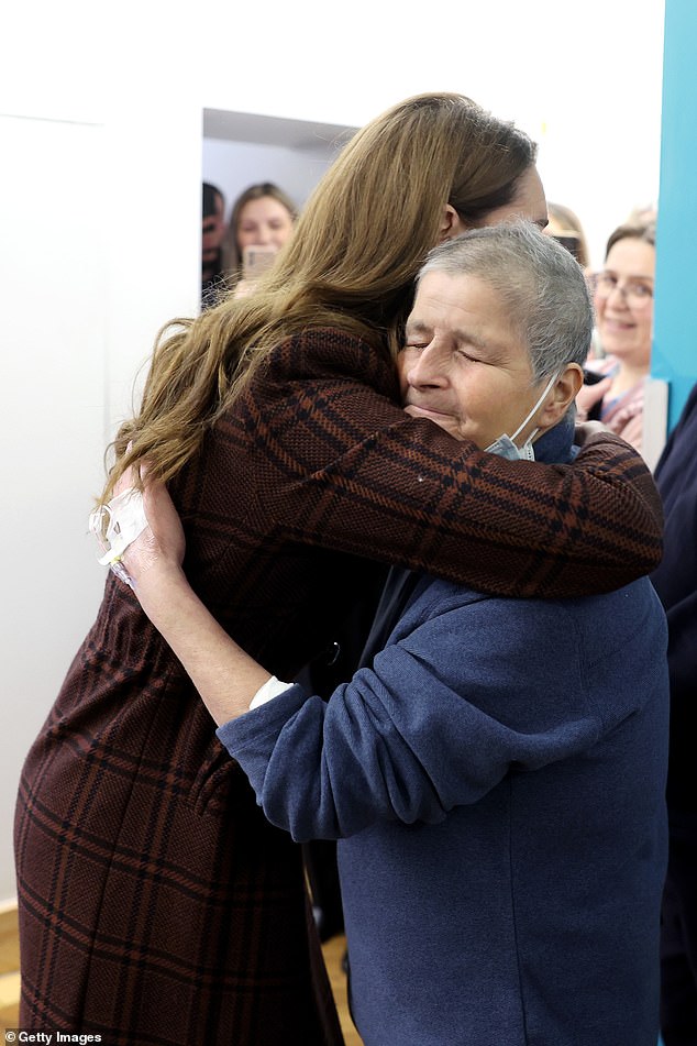 The Princess of Wales hugs patient Rebecca Mendelhson at the Royal Marsden Hospital today