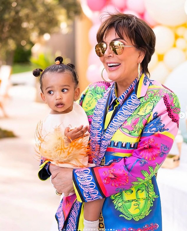 Momager Kris Jenner also shared a post for Chicago as she was seen holding the little girl in her arms. 'Happy birthday to our sweet Chi Chi!' began the girlfriend of Corey Gamble