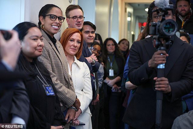 Former White House Press Secretary Jen Psaki (center in white) attends White House Press Secretary Karine Jean-Pierre's final press briefing of the Biden administration