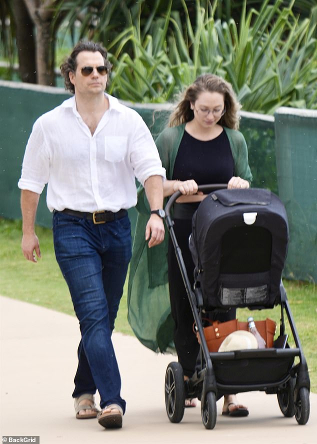 The ultra private pair, who have not revealed the gender or name of their baby, had the little one in a pram as they enjoyed the summer weather