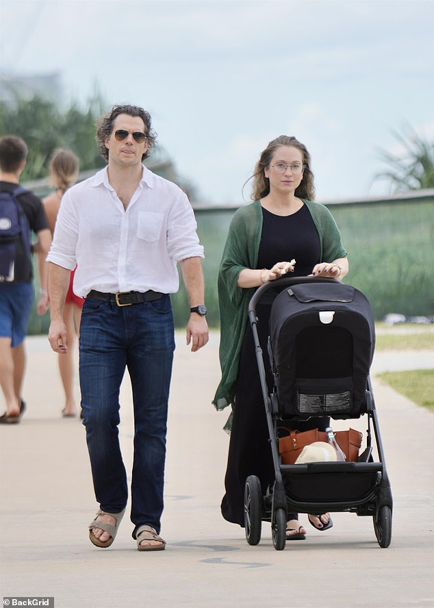 Henry Cavill is settling into life in Australia as he prepares to film his latest film. The British actor, 41, and his girlfriend Natalie Viscuso took a stroll on Queensland 's Gold Coast on Saturday, ahead of his busy schedule shooting the Voltron feature. Both pictured