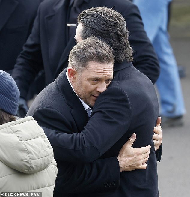 Actors on set were seen embracing as they filmed the emotional scenes at a funeral