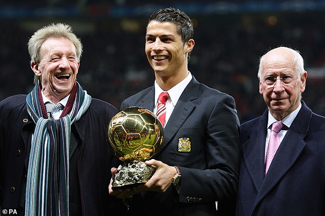 Law (left) and Charlton (right) alongside Cristiano Ronaldo as he won his first Ballon d'Or award at Man United