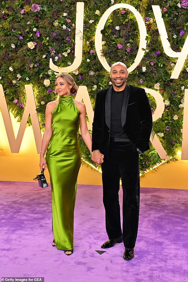 Andrea Rajacic and Thierry Henry walked hand-in-hand onto the carpet for pictures