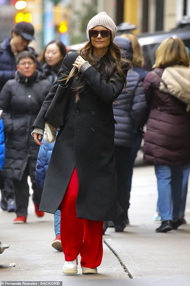 Katie Holmes was spotted cheerfully making her way to Broadway ahead of her production of Our Town's final string of shows in New York City