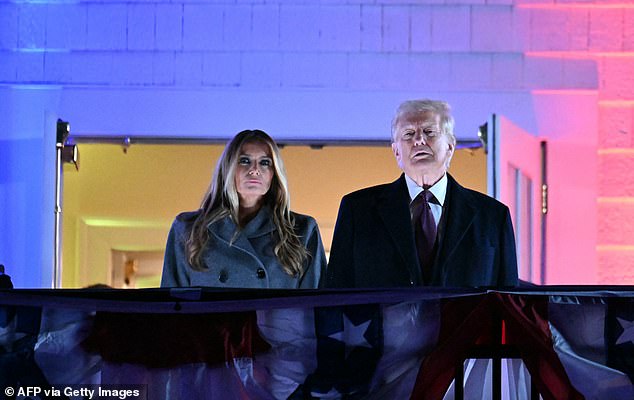 Donald Trump and his wife Melania Trump get ready to watch fireworks in his honor at Trump National Golf Club Washington DC in Sterling, Virginia