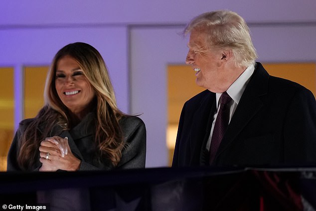 Donald Trump and wife Melania were all smiles as they watched a fireworks display at one of the many celebrations being held in the Washington D.C. area ahead of the inauguration