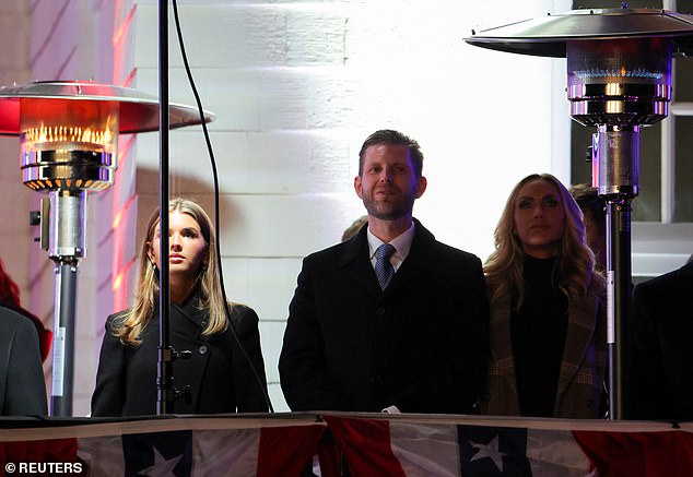 Eric Trump and Lara Trump watch a fireworks display ahead of the inauguration