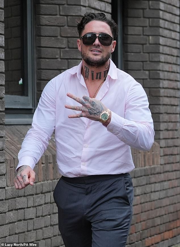 Stephen Bear, makes a gesture as he leaves Chelmsford Crown Court, Essex, after his confiscation hearing in March last year