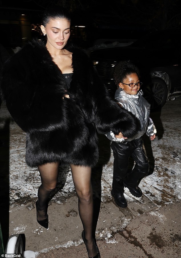 The businesswoman, 27, wore a little black dress and fur coat for a night out at Casa Tua with stylish Kendall, 29