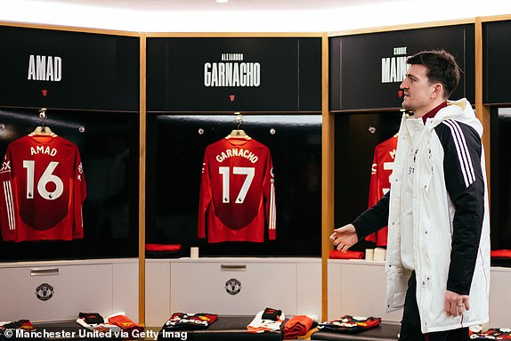 MANCHESTER, ENGLAND - JANUARY 19: Harry Maguire of Manchester United looks on inside the Manchester United dressing room prior to the Premier League match between Manchester United FC and Brighton & Hove Albion FC at Old Trafford on January 19, 2025 in Manchester, England. (Photo by Ash Donelon/Manchester United via Getty Images)