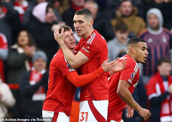 Soccer Football - Premier League - Nottingham Forest v Southampton - The City Ground, Nottingham, Britain - January 19, 2025 Nottingham Forest's Elliot Anderson celebrates scoring their first goal with Nikola Milenkovic Action Images via Reuters/Andrew Boyers EDITORIAL USE ONLY. NO USE WITH UNAUTHORIZED AUDIO, VIDEO, DATA, FIXTURE LISTS, CLUB/LEAGUE LOGOS OR 'LIVE' SERVICES. ONLINE IN-MATCH USE LIMITED TO 120 IMAGES, NO VIDEO EMULATION. NO USE IN BETTING, GAMES OR SINGLE CLUB/LEAGUE/PLAYER PUBLICATIONS. PLEASE CONTACT YOUR ACCOUNT REPRESENTATIVE FOR FURTHER DETAILS..