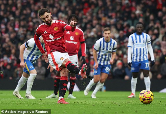 Soccer Football - Premier League - Manchester United v Brighton & Hove Albion - Old Trafford, Manchester, Britain - January 19, 2025 Manchester United's Bruno Fernandes scores their first goal from the penalty spot Action Images via Reuters/Lee Smith EDITORIAL USE ONLY. NO USE WITH UNAUTHORIZED AUDIO, VIDEO, DATA, FIXTURE LISTS, CLUB/LEAGUE LOGOS OR 'LIVE' SERVICES. ONLINE IN-MATCH USE LIMITED TO 120 IMAGES, NO VIDEO EMULATION. NO USE IN BETTING, GAMES OR SINGLE CLUB/LEAGUE/PLAYER PUBLICATIONS. PLEASE CONTACT YOUR ACCOUNT REPRESENTATIVE FOR FURTHER DETAILS..