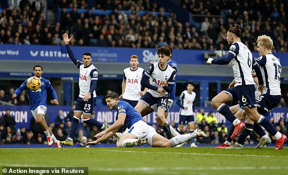 Soccer Football - Premier League - Everton v Tottenham Hotspur - Goodison Park, Liverpool, Britain - January 19, 2025 Everton's James Tarkowski in action with Tottenham Hotspur's Archie Gray Action Images via Reuters/Jason Cairnduff EDITORIAL USE ONLY. NO USE WITH UNAUTHORIZED AUDIO, VIDEO, DATA, FIXTURE LISTS, CLUB/LEAGUE LOGOS OR 'LIVE' SERVICES. ONLINE IN-MATCH USE LIMITED TO 120 IMAGES, NO VIDEO EMULATION. NO USE IN BETTING, GAMES OR SINGLE CLUB/LEAGUE/PLAYER PUBLICATIONS. PLEASE CONTACT YOUR ACCOUNT REPRESENTATIVE FOR FURTHER DETAILS..