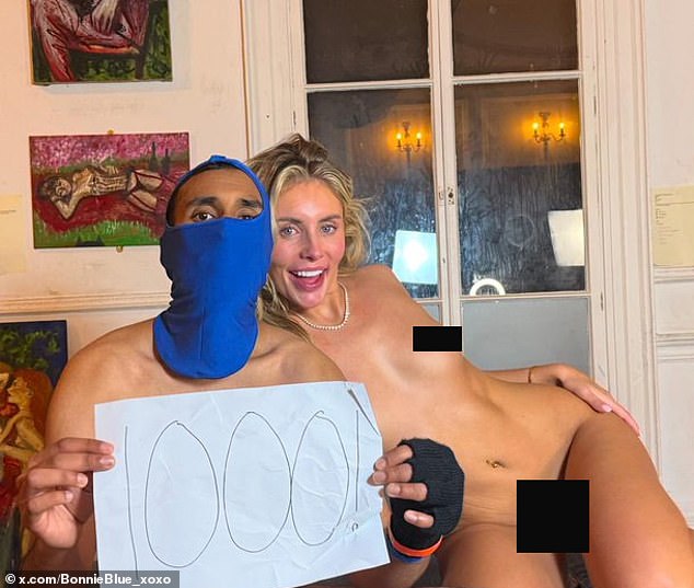 Bonnie Blue posed alongside the man who was allegedly the 1,000th she slept with in 12 hours