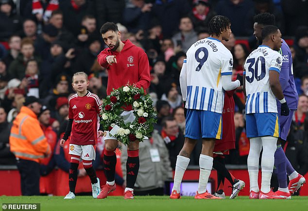 Bruno Fernandes also carried on flowers to be laid in memory of the iconic forward