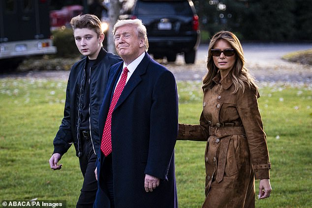 The former and future first lady has inked a reported $40 million deal with billionaire Jeff Bezos's Amazon to produce a feature-length documentary and follow-up docuseries about her working life. (Barron, Donald and Melania are pictured in 2019).