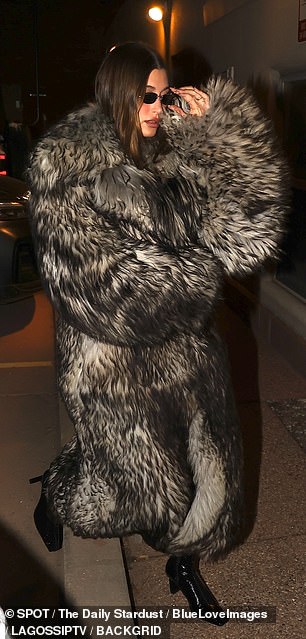 Hailey Baldwin Bieber bundled up in a stylish winter coat to dine on Northern Italian fare at Casa Tua in Aspen, CO on Saturday night