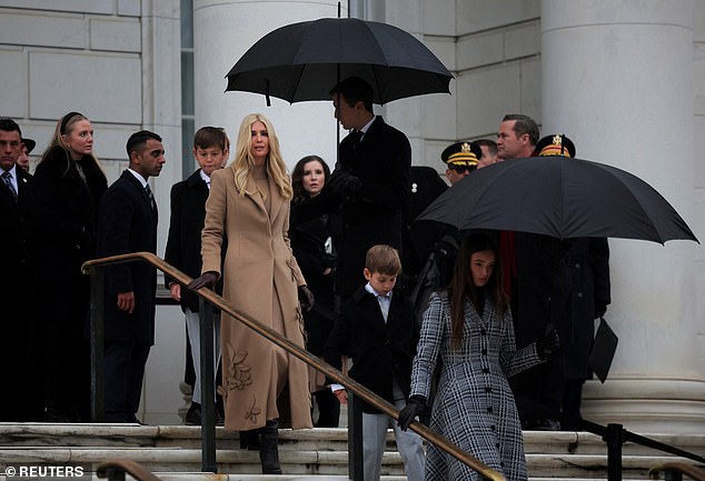 Ivanka Trump and her husband, Jared Kushner, attend the wreath laying with their children