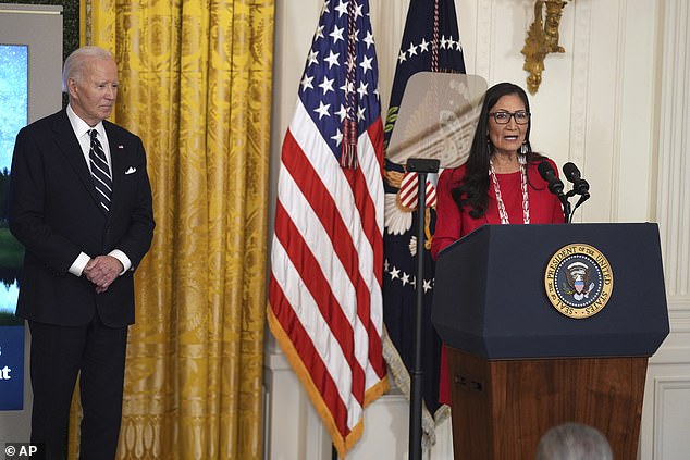 President Joe Biden listens as Interior Secretary Deb Haaland speaks during the designation event at the White House