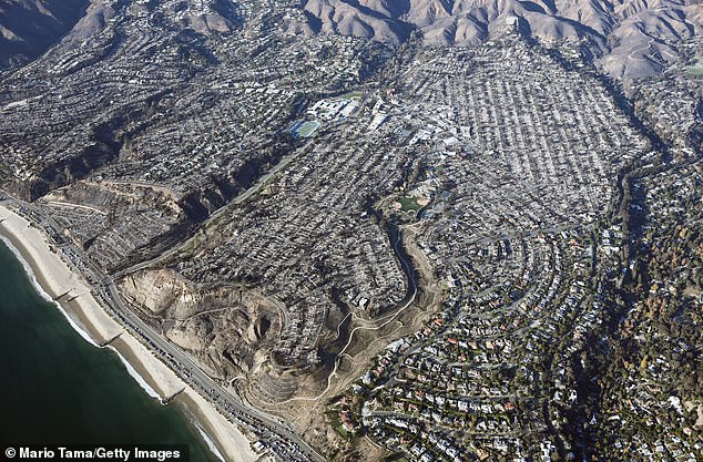 Firefighters have entered day 12 of the battle against two different wildfires destroying nearly 40K acres with the Palisades fire being 52% contained and the Eaton (Altadena) fire being 81% contained (Pacific Palisades pictured January 13)