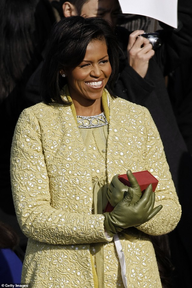 Michelle Obama holds the Lincoln bible at the inauguration of Barack Obama in 2009