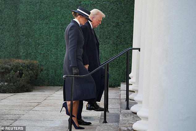 The future first lady opted for a long, tailored navy-blue coat along with a pair of navy-blue suede heels and black leather gloves