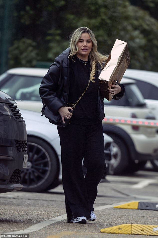 Georgia opted for all-black loungewear to attend the party and was seen carrying a large gift