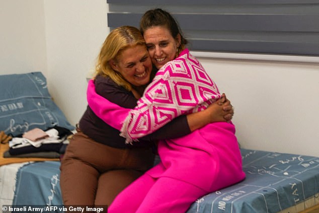 Doron Steinbracher with her mother Simone, hugging after her release