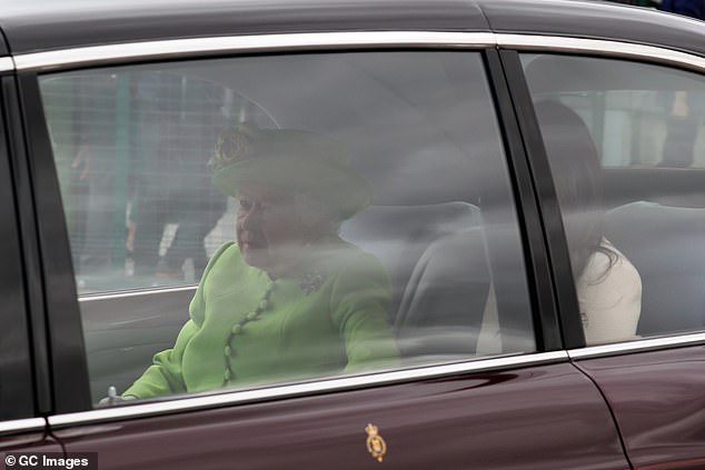 Meghan and the Queen in the car after they got past the awkward moment surrounding who was meant to get in first