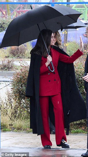 Although the Spanish capital city had grey skies and drizzle, the royal, 52, did not let that rain on her parade