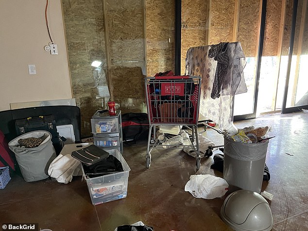 Trash and scattered belongings fill the space of the boarded up, abandoned buildings following the sale of the entertainers' estate following their deaths