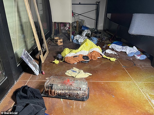 Piles of garbage litter the inside of the grand mansion as homeless people take refuge in the abandoned buildings