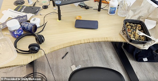 His last meal, a half-eaten ready-meal with brown rice still in the plastic tray, sits on his cluttered desk with a fork and a restaurant receipt