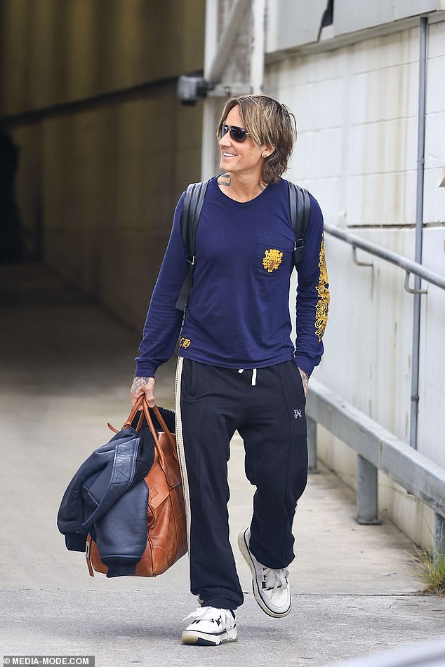 Keith Urban jetted back to Australia on Friday ahead of his honour at the Tamworth Country Music Festival