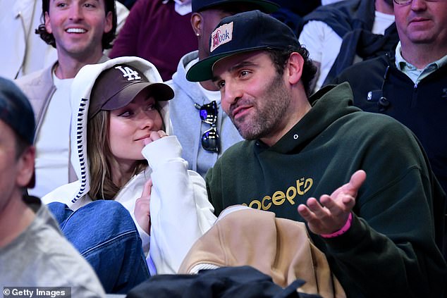 Olivia Wilde was spotting cosying up to Dane Diliegro in the first sighting of a potential new romance following her relationship with ex-boyfriend Harry Styles