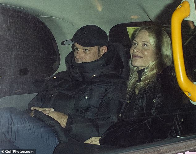 She left the party in a black cab with her billionaire businessman partner Archie Keswick