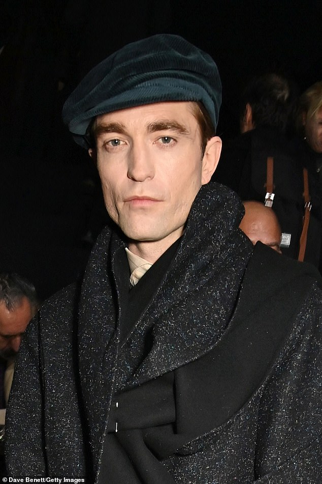 He completed the ensemble with a velvet flat cap