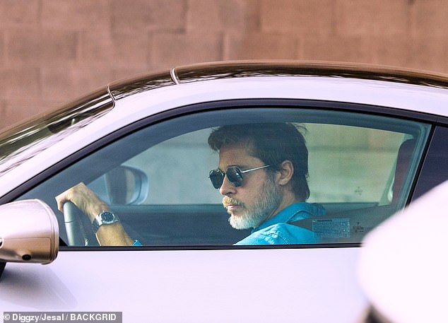 The actor, 61, was driving around Hollywood in his slick Porsche on Thursday