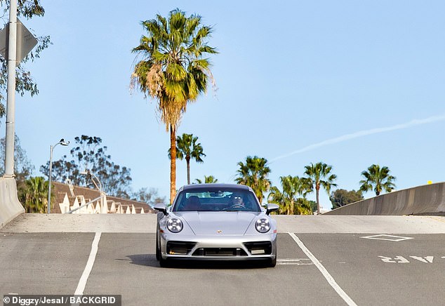 Pitt enjoyed a drive through LA in his sleek sportscar