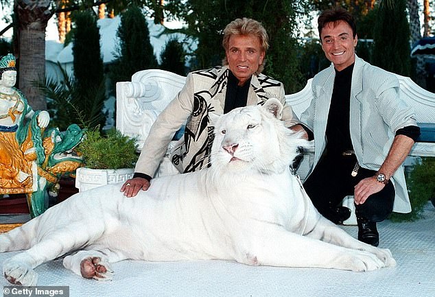 Siegfried & Roy with one of their tigers on the incredible property