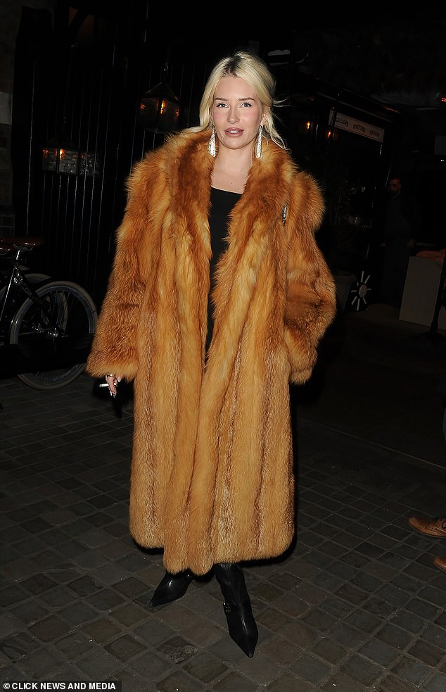 Lottie Moss looked stunning in a black dress, opulent fur coat and leather boots