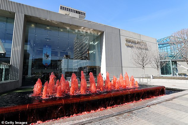 A fountain colored red outside Crown Center in downtown Kansas City shows support for the Kansas City Chiefs ahead of Super Bowl LV on February 03, 2021