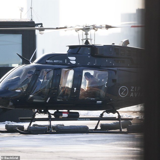 Bella arrived in a private helicopter