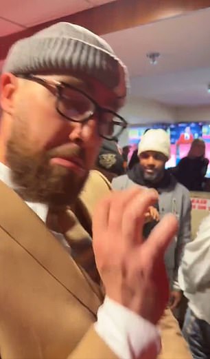 Footage quickly emerged of a suited Kelce dancing in the locker room